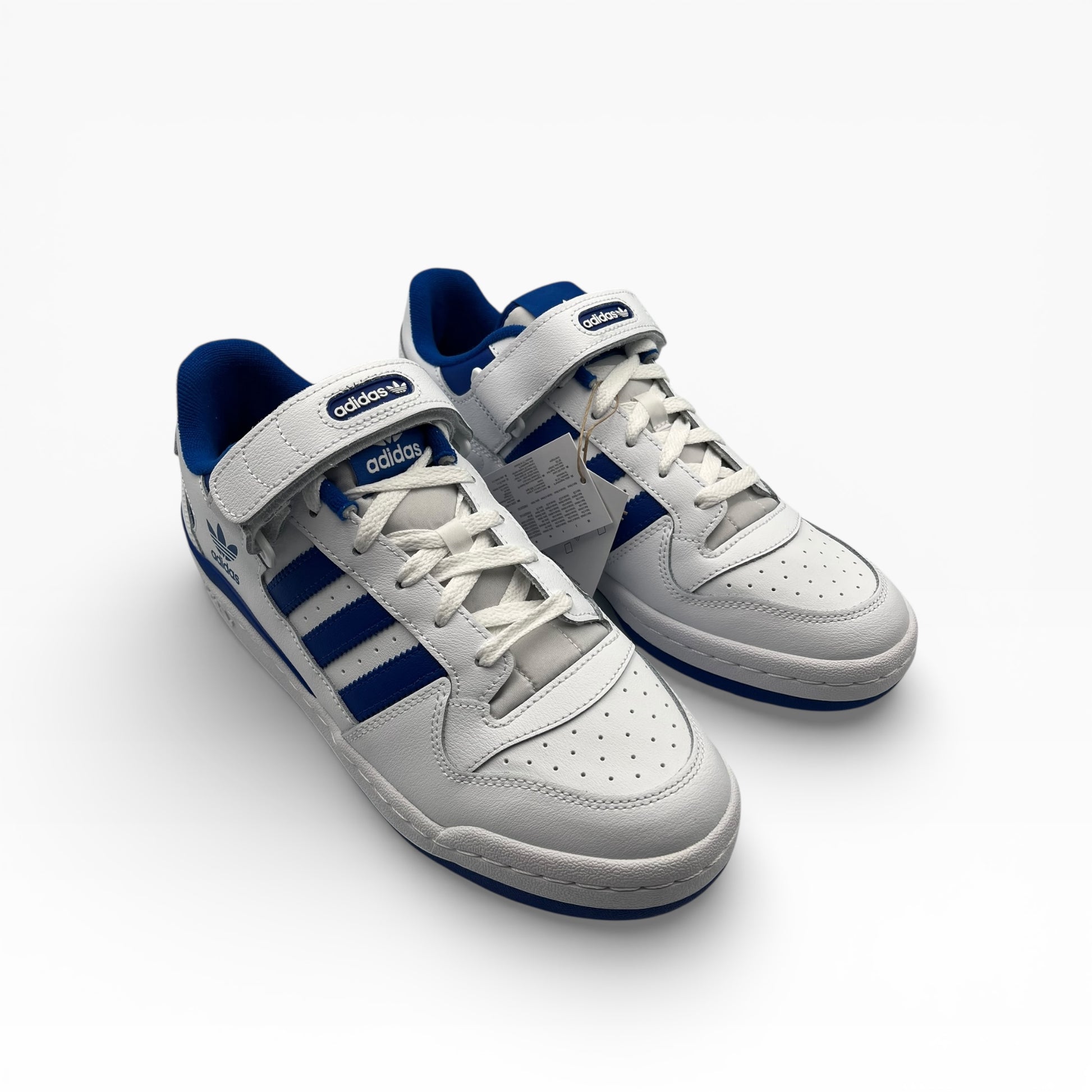 Baskets adidas blanches et bleues pour homme, style sport, présentées sur fond blanc, LA CHAUSSURERIE