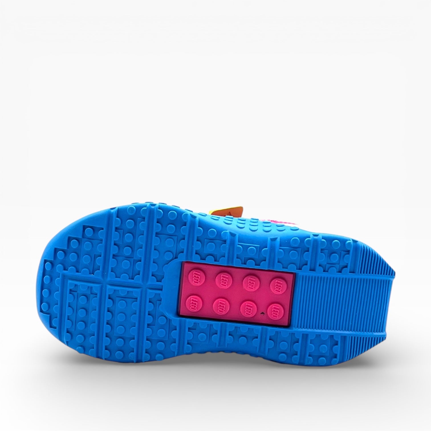Semelle de chaussure bleue et rose style LEGO, LA CHAUSSURERIE, fond blanc