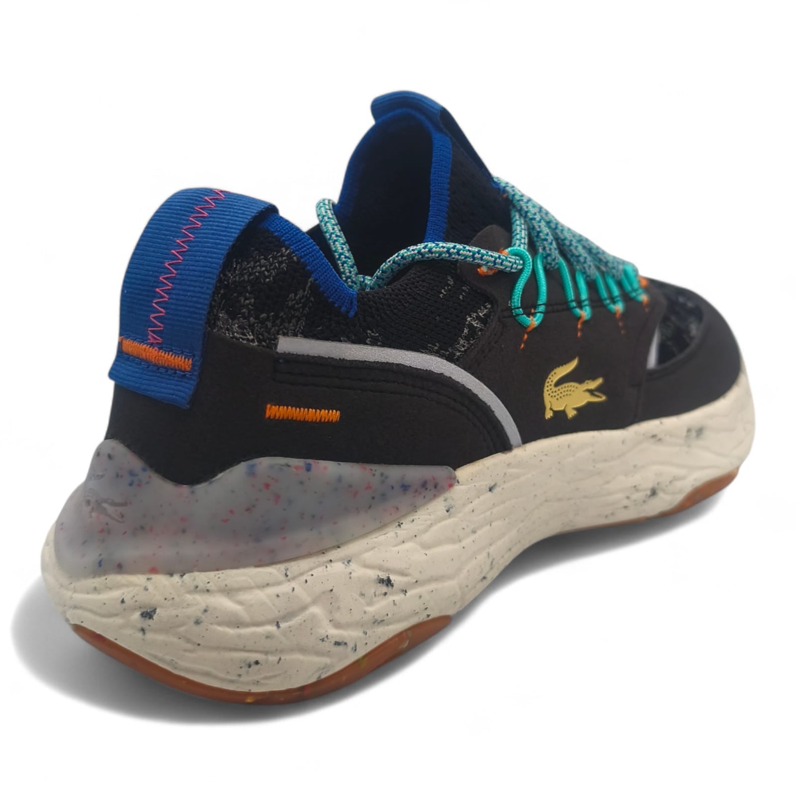 Baskets noires Lacoste homme semelle épaisse, détails colorés, LA CHAUSSURERIE