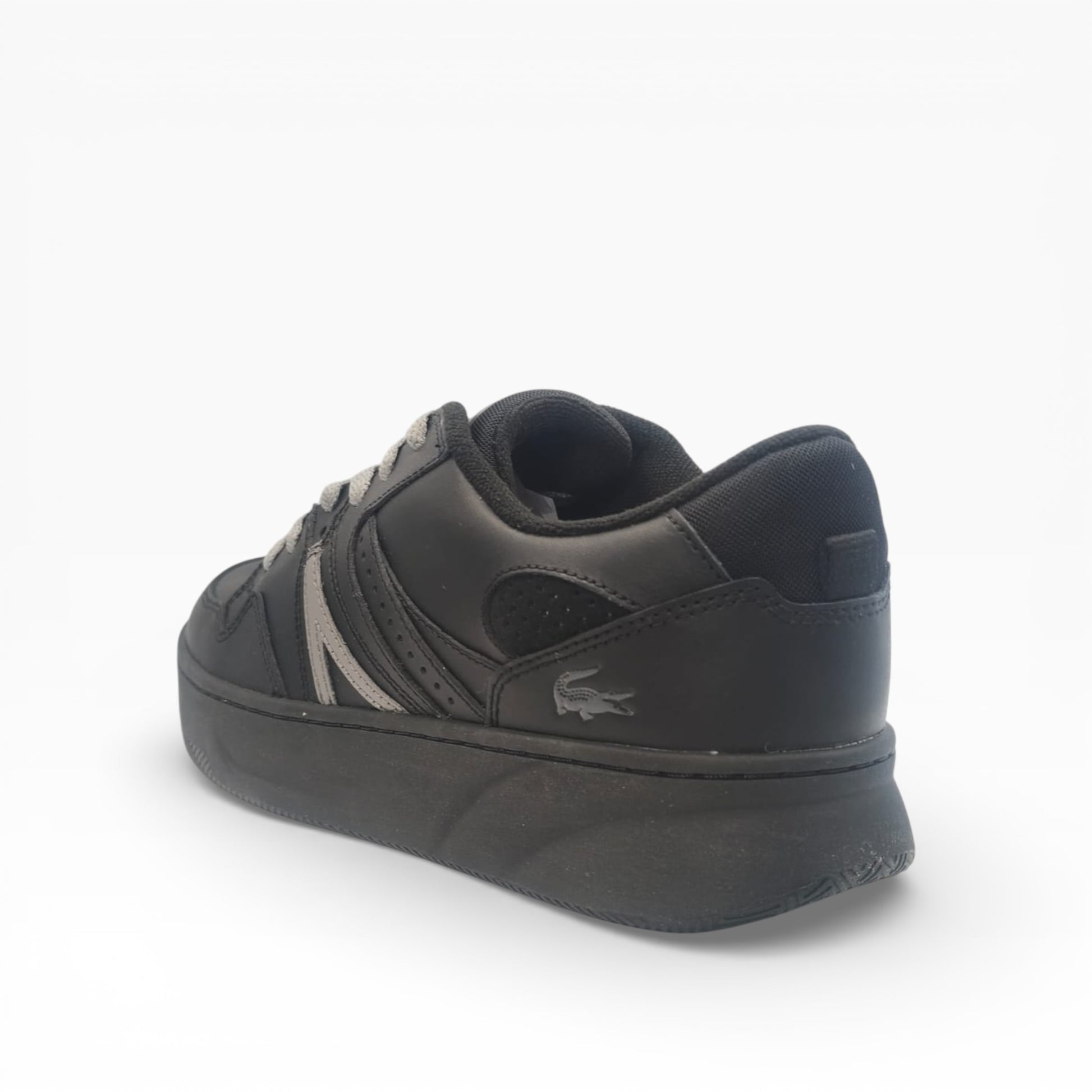 Baskets noires Lacoste vue arrière, détail logo, chaussure mode LA CHAUSSURERIE