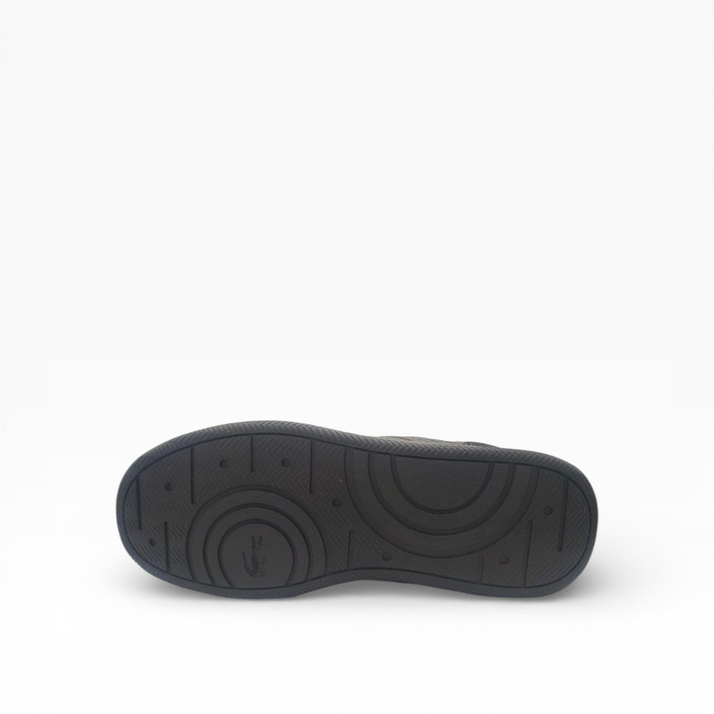 Semelle de chaussure noire vue de dessous, LA CHAUSSURERIE, fond blanc épuré