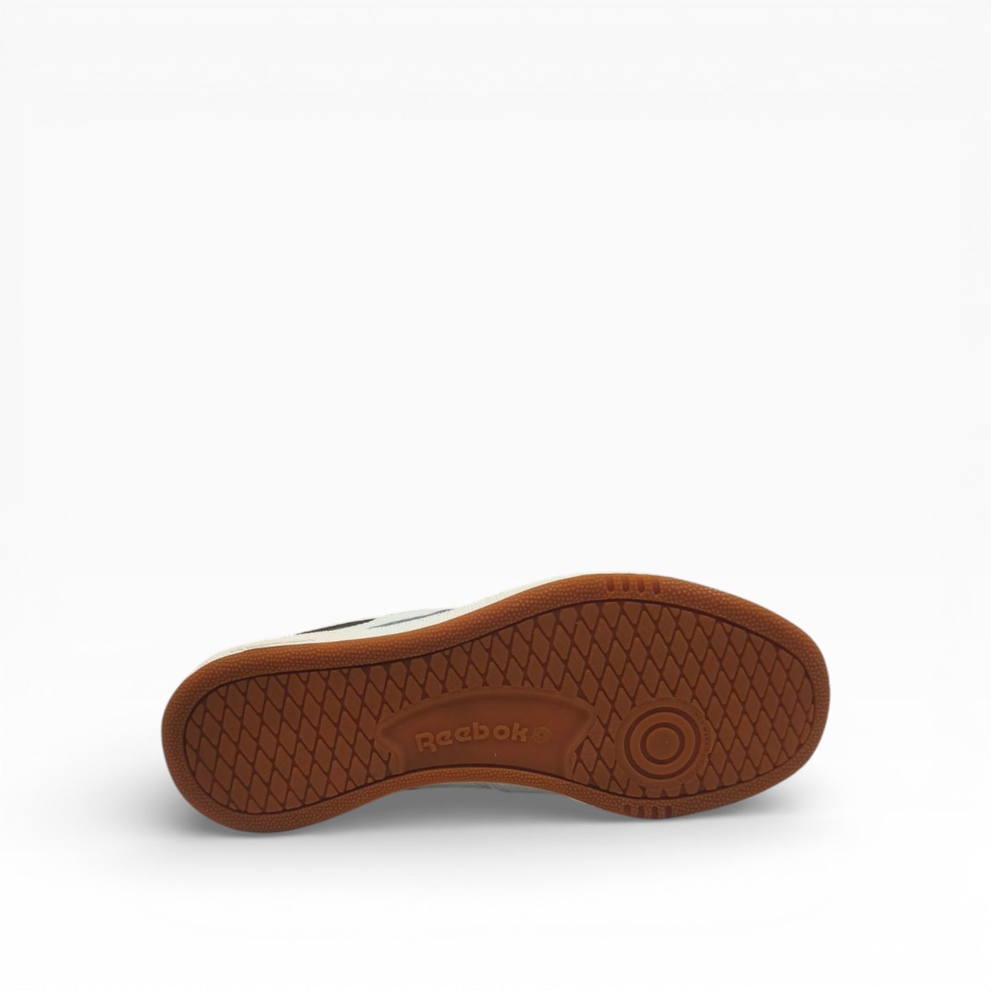 Semelle extérieure marron d’une basket Reebok Club C Revenge, mise en avant sur LA CHAUSSURERIE