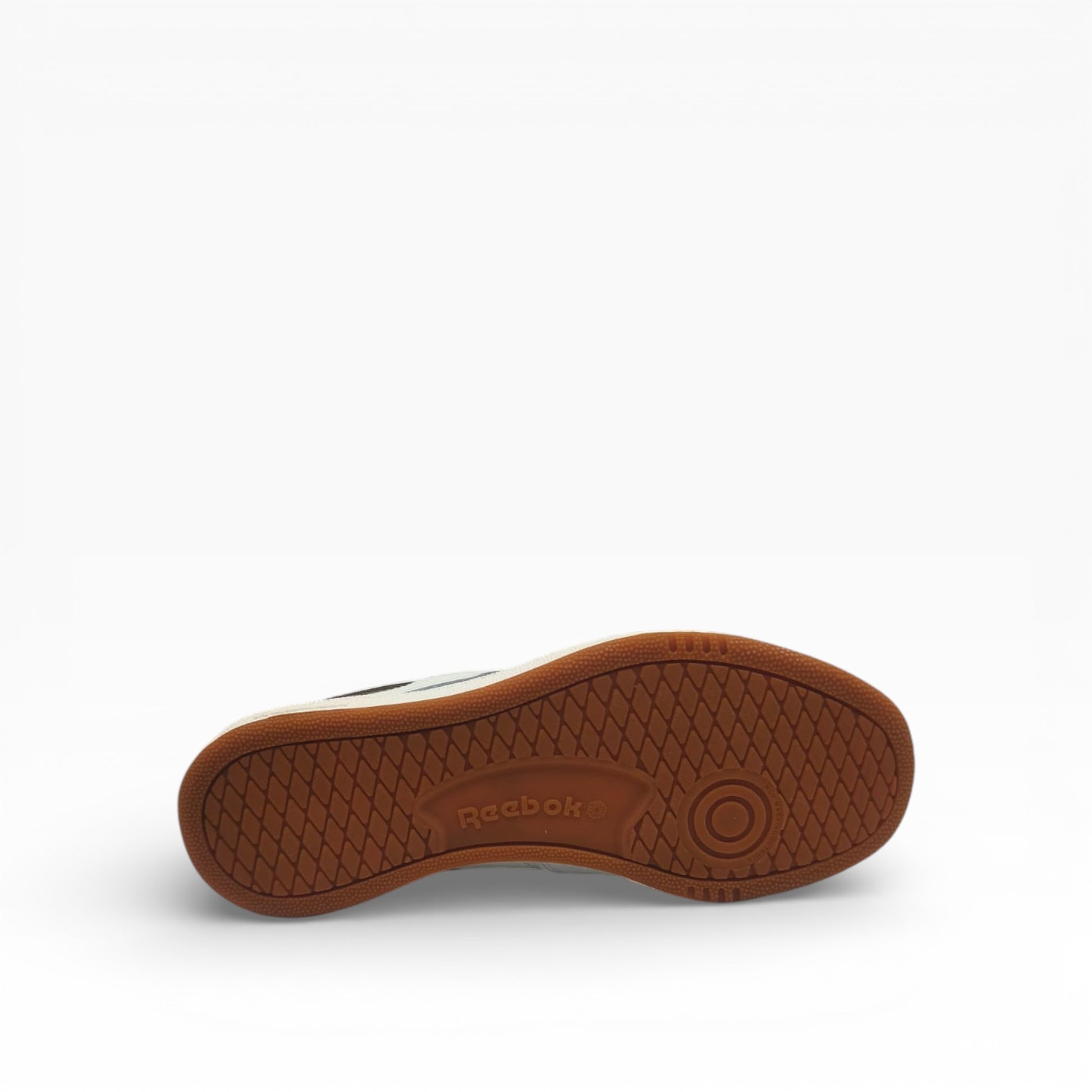Semelle extérieure marron d’une basket Reebok Club C Revenge, mise en avant sur LA CHAUSSURERIE